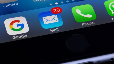 Image of a phone screen showing email, phone, Google and WhatsApp icons