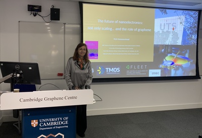 Prof. Francesca Iacopi standing at a lectern to give a talk 