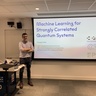 Man standing in front of a lecture screen next to a lectern.